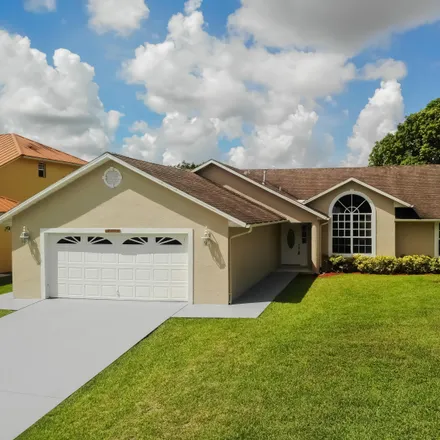 Buy this 3 bed house on 1654 Southwest Lexington Drive in Port Saint Lucie, FL 34953