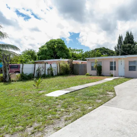 Rent this 3 bed house on 3753 Orange Street in Boynton Beach, FL 33462