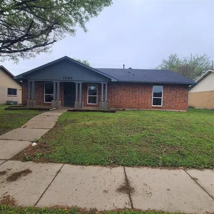Rent this 4 bed house on 1360 Applegate Drive in Lewisville, TX 75067