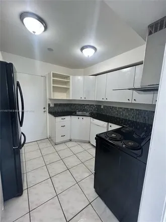 Rent this 2 bed condo on Racquet Club Apartments in 3301 Spanish Moss Terrace, Lauderhill