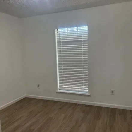 Rent this 4 bed apartment on 1546 Silverleaf Drive in Carrollton, TX 75007