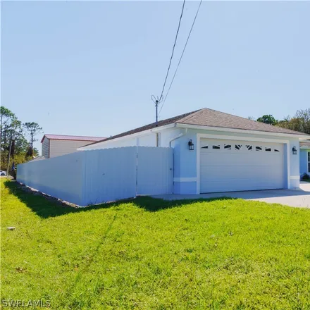 Buy this 3 bed house on 55 Irene Avenue South in Lehigh Acres, FL 33976