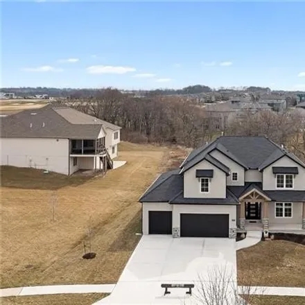 Buy this 5 bed house on 1207 Creekmoor Drive in Raymore, MO 64083
