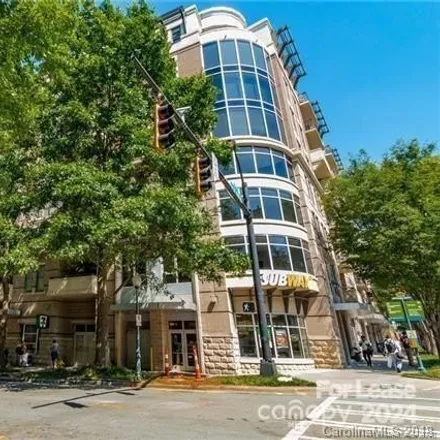 Rent this 2 bed condo on 718 Trade St W in Charlotte, North Carolina