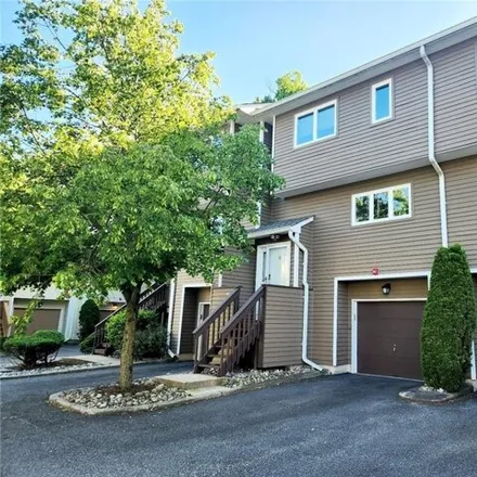 Rent this 2 bed townhouse on 76 Village Green in Nanuet, NY 10954