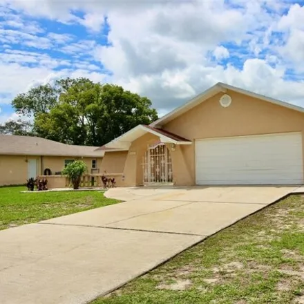 Buy this 3 bed house on 11208 Addison St in Spring Hill, Florida