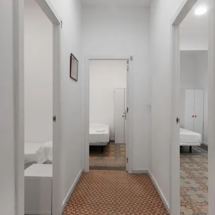 Rent this 11 bed apartment on Hostal Fina in Carrer de la Portaferrissa, 11