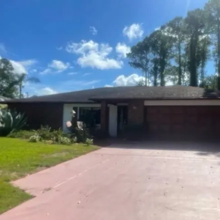 Buy this 4 bed house on 142 Breeze Hill Lane in Palm Coast, FL 32137