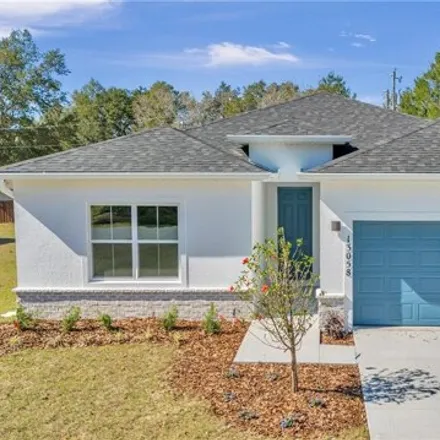 Buy this 4 bed house on 13024 Southwest 39th Avenue Road in Marion County, FL 34473