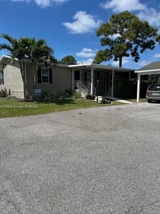 Buy this studio apartment on Meadows Circle North in Palm Beach Gardens, FL 33410