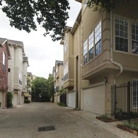 Rent this 3 bed townhouse on 5302 Blossom St in Houston, Texas