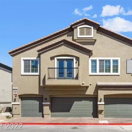 Buy this 2 bed townhouse on Moonbow Avenue in North Las Vegas, NV 89085
