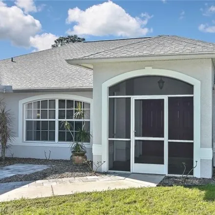 Buy this 3 bed house on 1256 County Street in Lehigh Acres, FL 33974