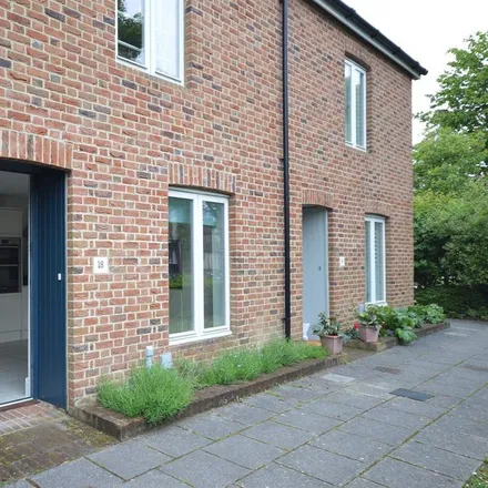 Rent this 2 bed townhouse on 1 Richmond Avenue in Chichester, PO19 6BP