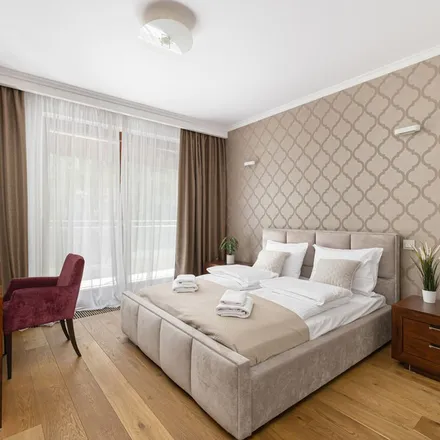 Rent this 3 bed apartment on Grzybowska 4 in 00-131 Warsaw, Poland