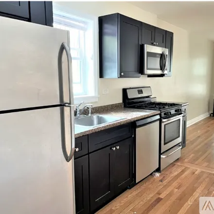 Rent this 2 bed apartment on 3908 W Montrose Ave