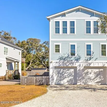 Buy this 4 bed house on 208 Se 78th St in Oak Island, North Carolina