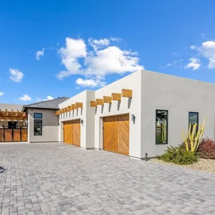 Buy this 4 bed house on 7542 East Sundown Court in Scottsdale, AZ 85250