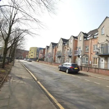 Rent this 4 bed townhouse on 13 Dearden Street in Manchester, M15 5LZ