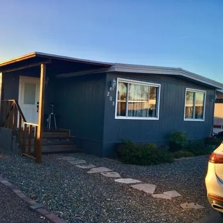 Buy this studio apartment on Mobile Home Park in Glendale, AZ 85301