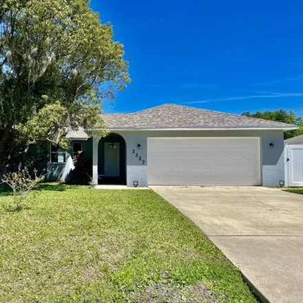 Buy this 3 bed house on 2327 Umbrella Tree Drive in Edgewater, FL 32141
