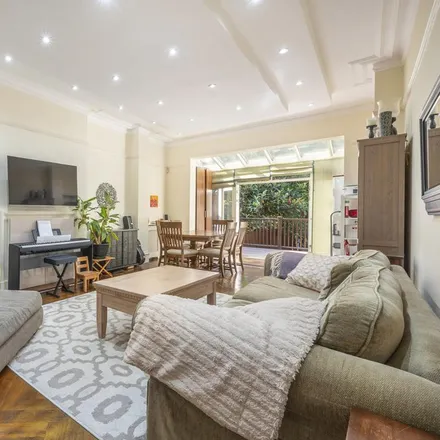 Rent this 3 bed apartment on Leinster Mansions in Frognal Lane, London