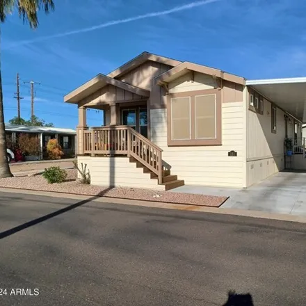 Buy this studio apartment on 9499 East University Drive in Maricopa County, AZ 85207