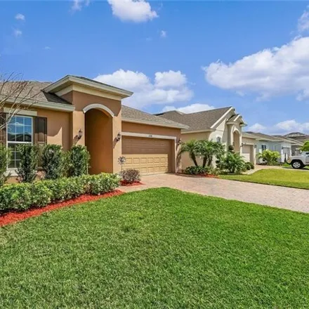 Rent this 4 bed house on 4788 Riverwalk Dr in Saint Cloud, Florida