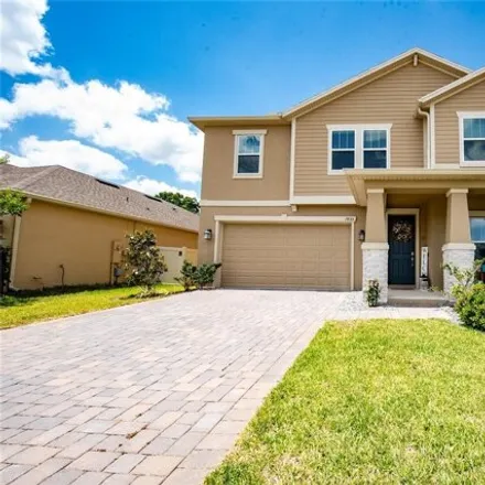 Buy this 4 bed house on 1899 Black Maple Place in Ocoee, FL 34761