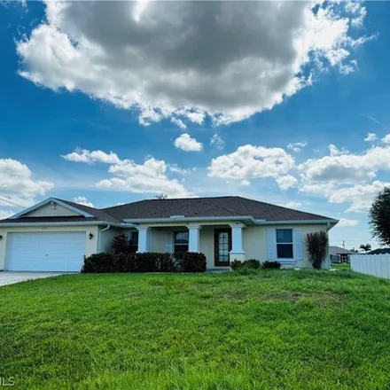 Rent this 3 bed house on 1212 NW 15th Ave in Cape Coral, Florida