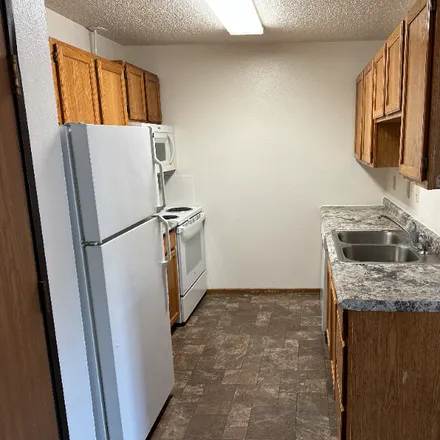 Rent this 3 bed apartment on 1401 12th St E