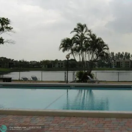 Buy this 2 bed condo on 244 Lake Pointe Drive in Broward County, FL 33309