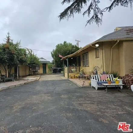 Buy this 4 bed house on 584 East 13th Street in Beaumont, CA 92223