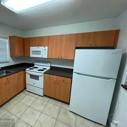 Rent this 1 bed condo on 4765 Northwest 9th Drive in Breezeswept Park Estates, Plantation