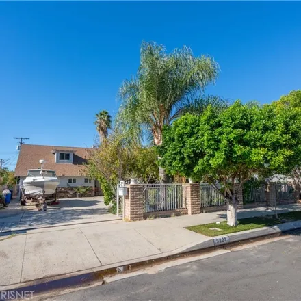 Buy this 4 bed house on 9021 Oneida Avenue in Los Angeles, CA 91352
