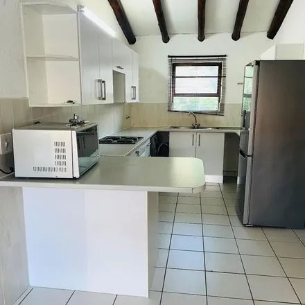 Rent this 2 bed townhouse on Woodburn Road in Morningside, Sandton