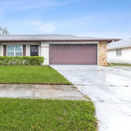 Buy this 3 bed house on 8026 Blue Finch Way in Seven Springs, Pasco County