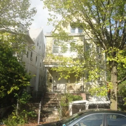 Buy this 8 bed townhouse on 53 Rose Terrace in Newark, NJ 07108
