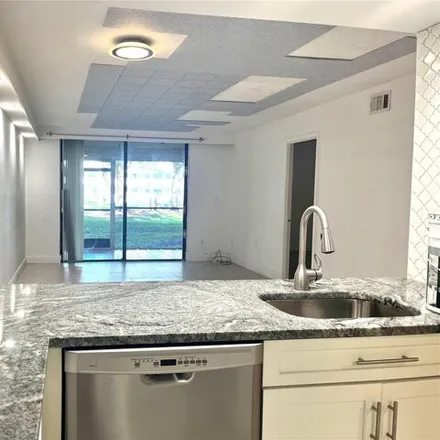 Rent this 2 bed condo on 6854 Cypress Road in Plantation, FL 33317