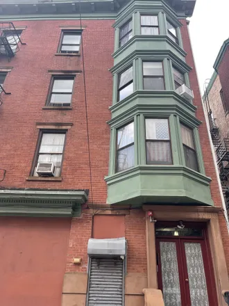 Rent this 3 bed townhouse on Norman's Pharmacy in Wayne Street, Jersey City
