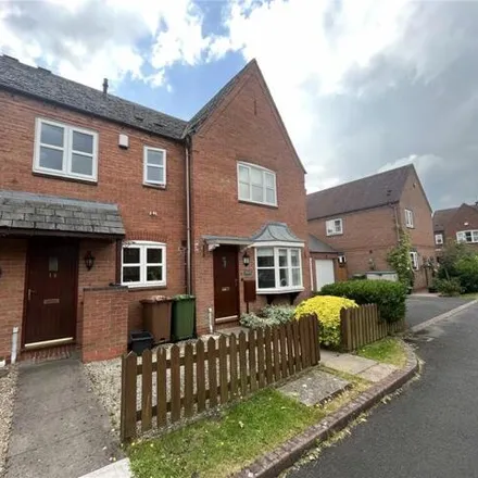 Rent this 2 bed townhouse on Ivy Way in Dickens Heath, B90 1RR