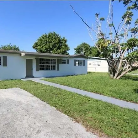 Buy this 4 bed house on 2355 Northwest 207th Street in Lake Lucerne, Miami Gardens