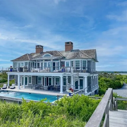 Rent this 4 bed house on 202 Dune Rd in Quogue, New York