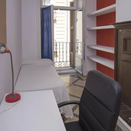 Rent this 8 bed room on Madrid in Hostal Conchita II, Calle de Campomanes
