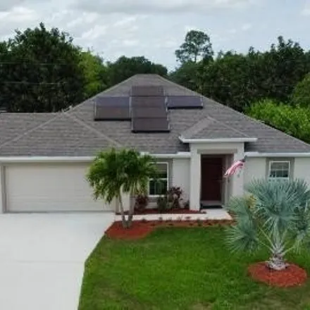 Buy this 3 bed house on 1585 Southwest Andalusia Road in Port Saint Lucie, FL 34953
