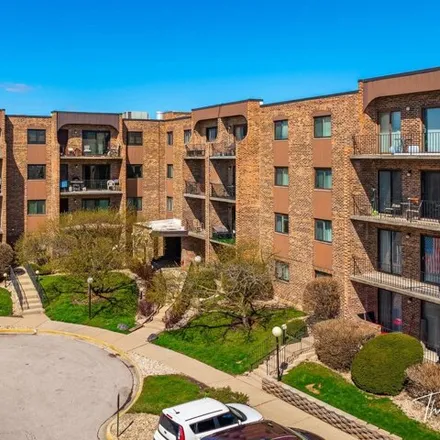 Buy this 2 bed condo on 601 West Huntington Commons Road in Mount Prospect, IL 60056