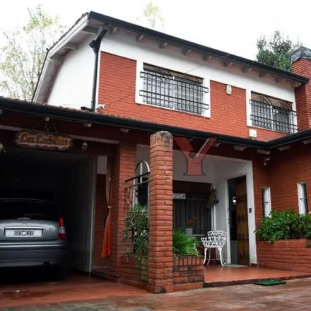 Buy this 5 bed house on Calle 13a in Partido de La Plata, 1896 City Bell