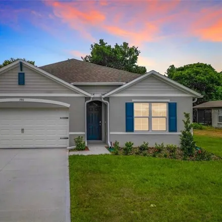 Rent this 4 bed house on 798 Coltra Lane in Deltona, FL 32725