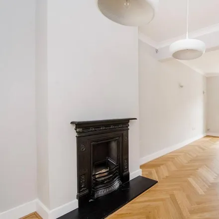 Rent this 4 bed house on Granville Road in London, SW19 1LR