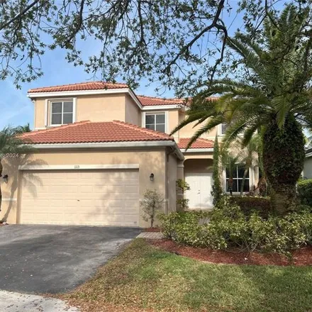 Rent this 4 bed house on 1113 Tupelo Way in Weston, FL 33327